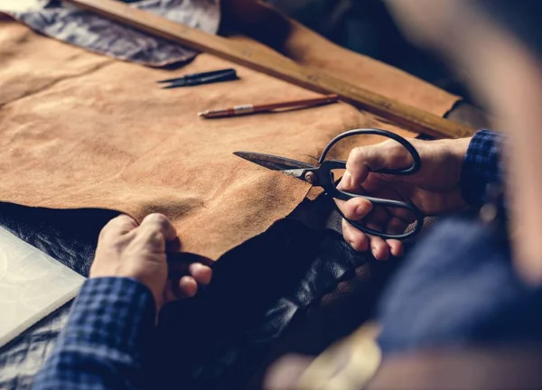 Craftsman Cutting Hide — Stock Photo, Image