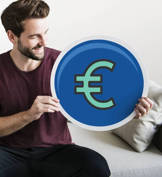 Ung Man Innehar Euro Ikon — Stockfoto