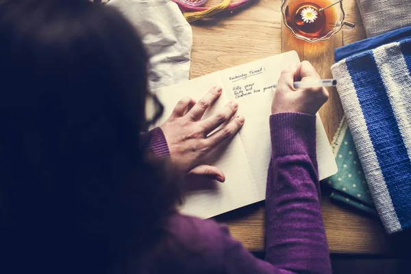 Aerial View Woman Writing Thread Color List Notebook — Stock Photo, Image