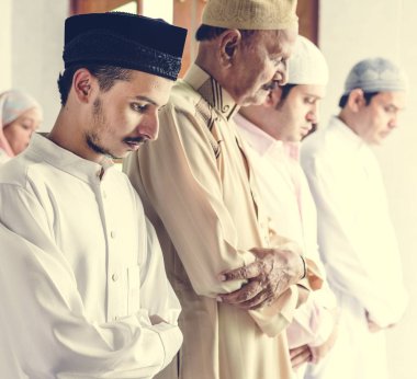 Muslim praying in Qiyaam posture clipart