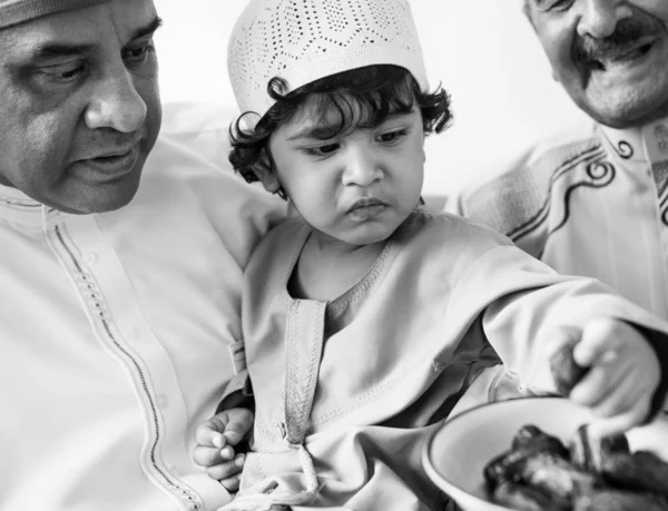 Muslim Boy Eating Dried Dates — Stock Photo, Image