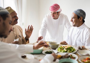 Muslim family having a Ramadan feast clipart