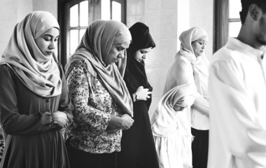 Muslim praying in Qiyaam posture clipart