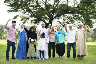 A happy large Muslim family clipart