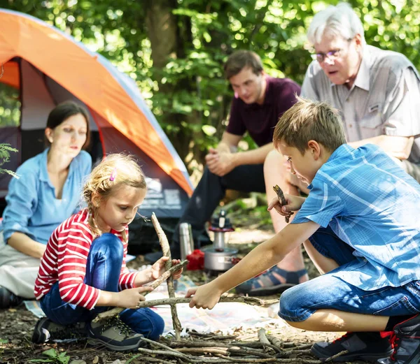 Family camping in the forest