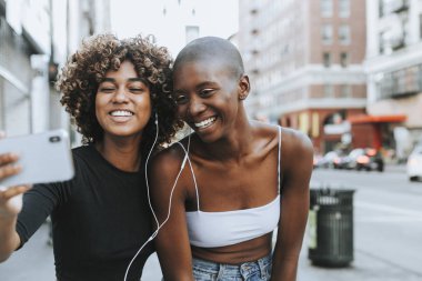 Cute girls making a video call clipart