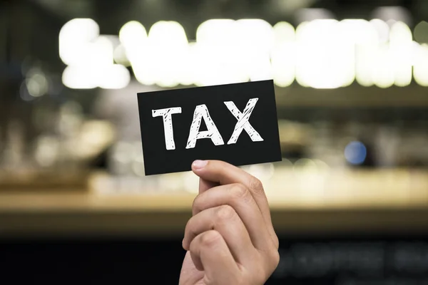 Mão Segurando Cartão Papel Preto Com Texto — Fotografia de Stock