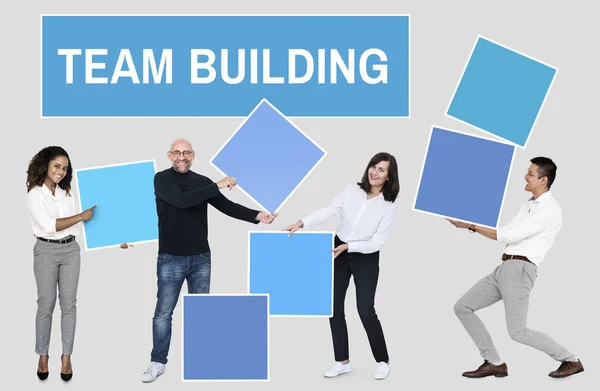 Smiling Businesspeople Blank Cards Success Teamwork Team Building Blue Backdrop — Stock Photo, Image