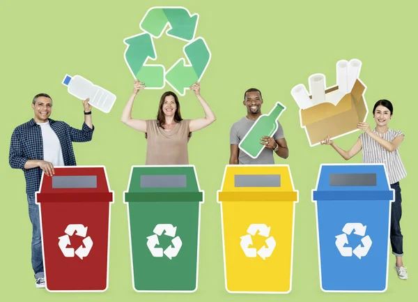 Group of people holding recycle icons