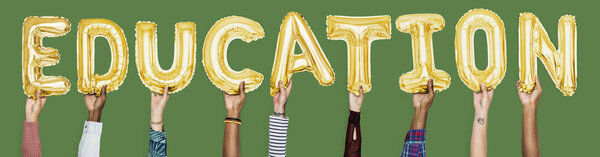 Hands showing education balloons word