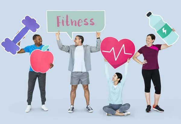 Gente Feliz Diversa Sosteniendo Iconos Deportivos — Foto de Stock