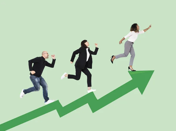 Business people rushing towards success on green arrow icon isolated on green background