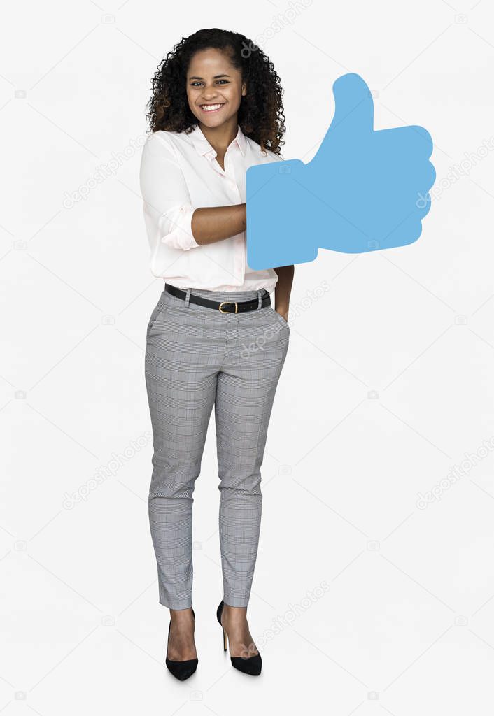 smiling african american businesswoman holding thumb up icon isolated on white backdrop