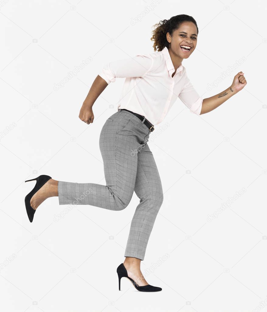 Cheerful businesswoman running isolated on white backdrop