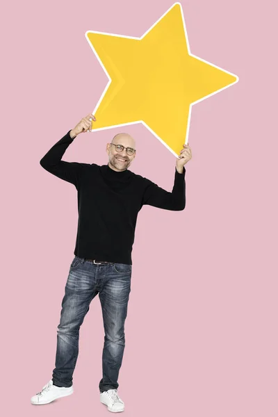 Büyük Bir Yıldız Simgesi Ile Mutlu Adam — Stok fotoğraf