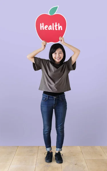 Vrolijke Vrouw Met Een Pictogram Van Gezondheid — Stockfoto