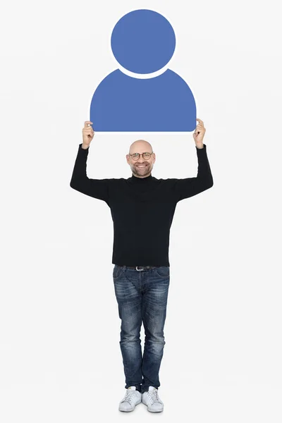 Szczęśliwy Człowiek Przytrzymując Ikonę Użytkownika Mężczyzna Niebieski — Zdjęcie stockowe