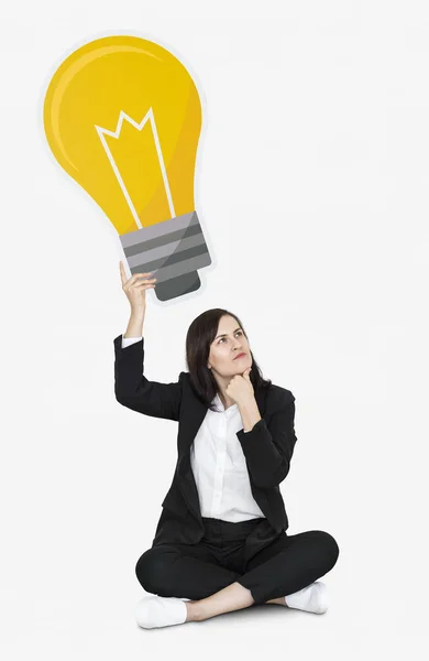 Mujer Reflexiva Con Icono Bombilla —  Fotos de Stock