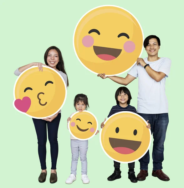 Happy Family Holding Emoji Icons — Stock Photo, Image