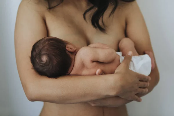 Naked Mother Holding Her Infant Baby Stock Picture