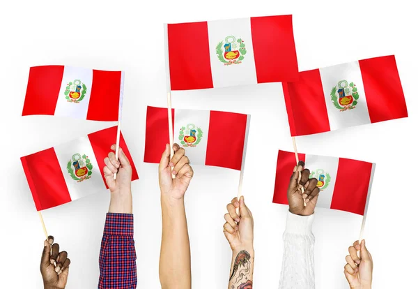 Manos Ondeando Las Banderas Perú —  Fotos de Stock
