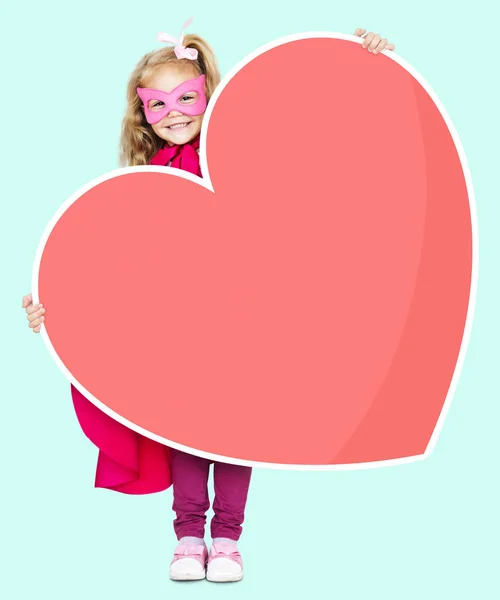 Superhero Girl Holding Heart Icon — Stock Photo, Image