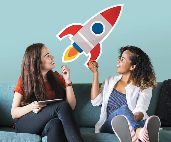 Cheerful Women Holding Rocket Icon — Stock Photo, Image