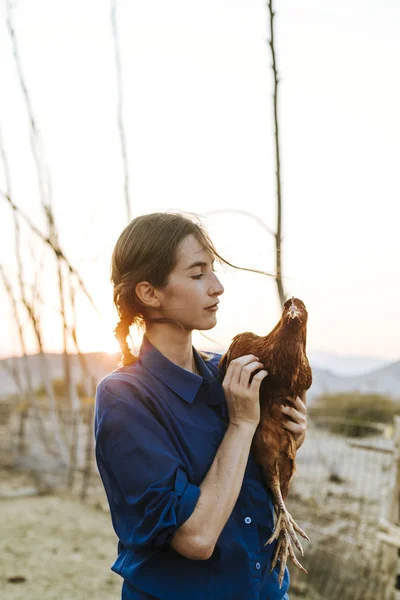 Young Woman Brown Hen Stock Image