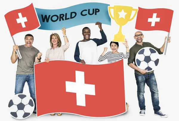 Diverse Football Fans Holding Flag Switzerland — Stock Photo, Image