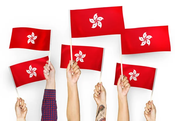 Ręce Wymachując Flagami Hong Kongu — Zdjęcie stockowe