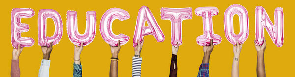 Hands showing education balloons word