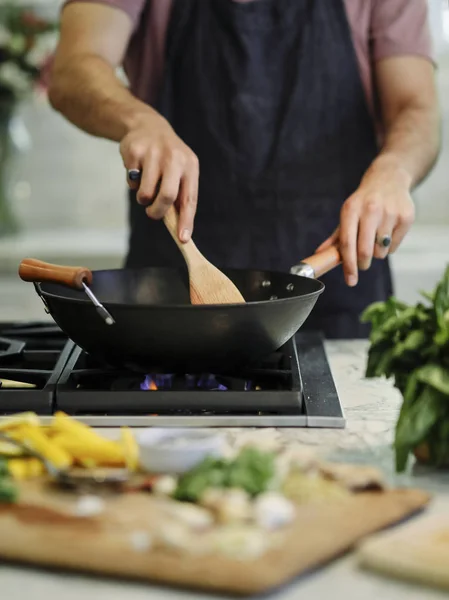 Chef cooking up a vegan pasta dish