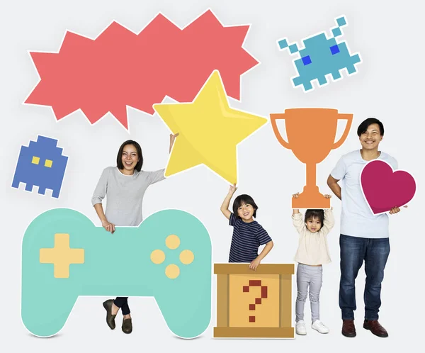 Família Feliz Segurando Ícones Jogos — Fotografia de Stock