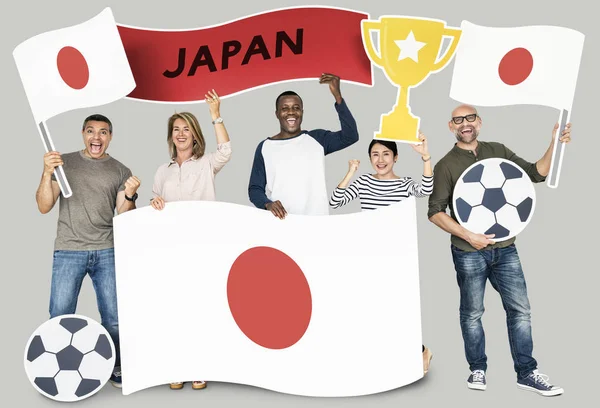 Diversos Fãs Futebol Segurando Bandeira Japão — Fotografia de Stock