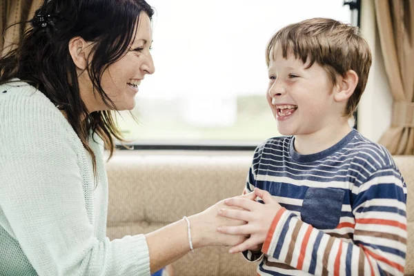 Cheerful Kid Playing His Mother — Stock Photo, Image