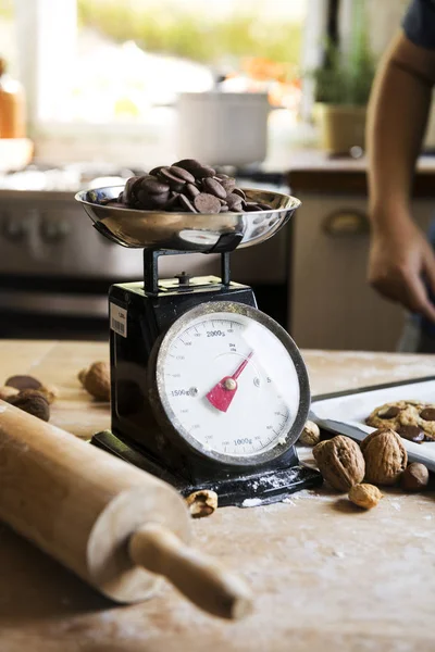 Dark chocolate on a kitchen scale