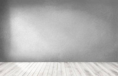 Gri duvar bir ahşap zemin ile boş bir odada