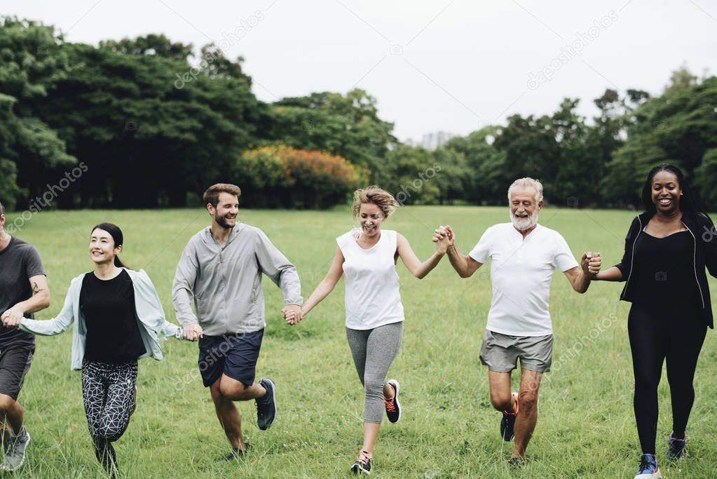 Happy diverse people enjoying in the park