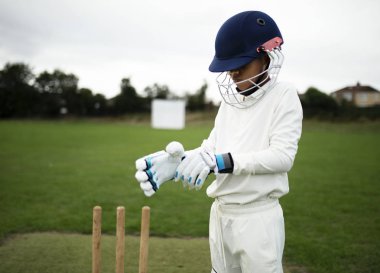 Cricket player getting ready to play clipart