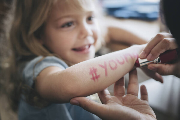Little Girl Hashtag Young Written Her Arm Stock Image