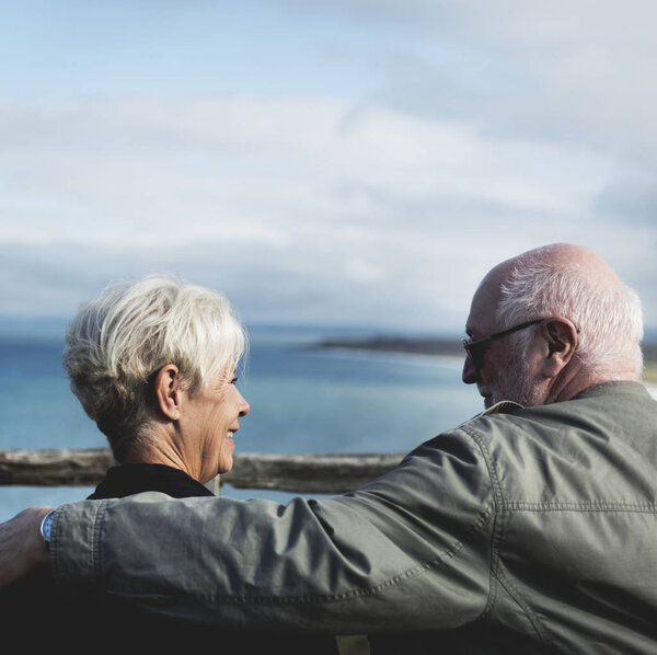Senior Couple Enjoying View Ocean Stock Picture