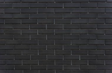Dokulu arka plan siyah tuğla duvar