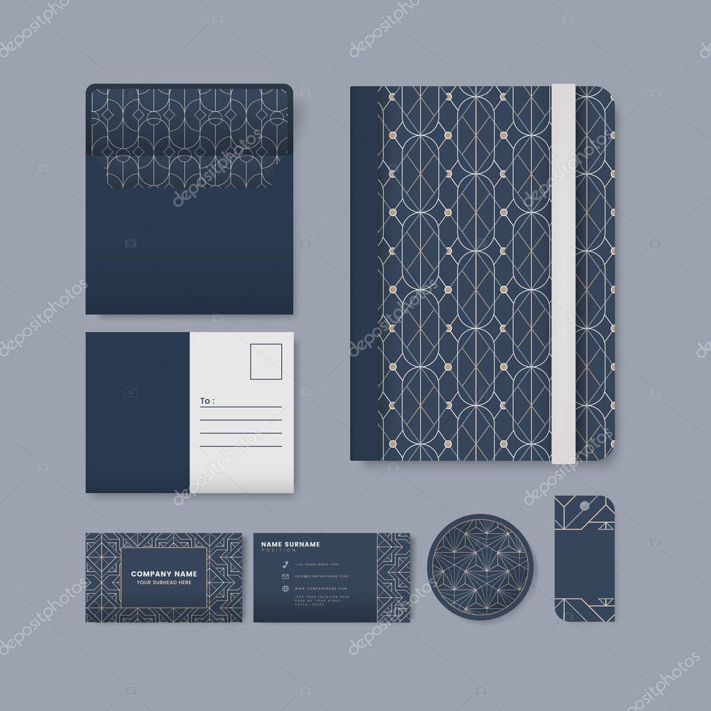 Set of white geometric pattern on blue surface stationery