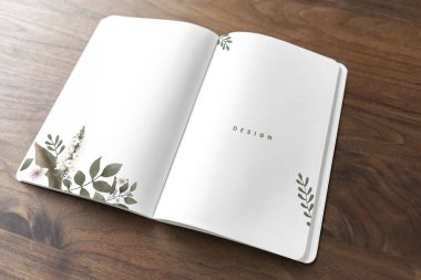 Floral notebook mockup on a wooden table clipart