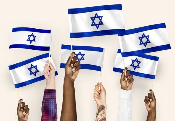 Manos Ondeando Banderas Israel —  Fotos de Stock