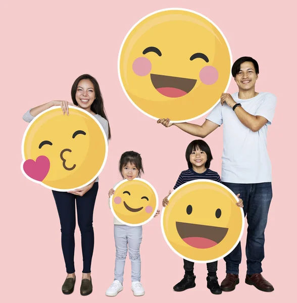 Happy Family Holding Emoji Icons — Stock Photo, Image