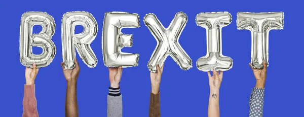Hands Holding Brexit Word Balloon Letters — Stock Photo, Image