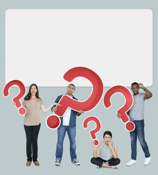 Diverse People Holding Question Mark Icons — Stock Photo, Image