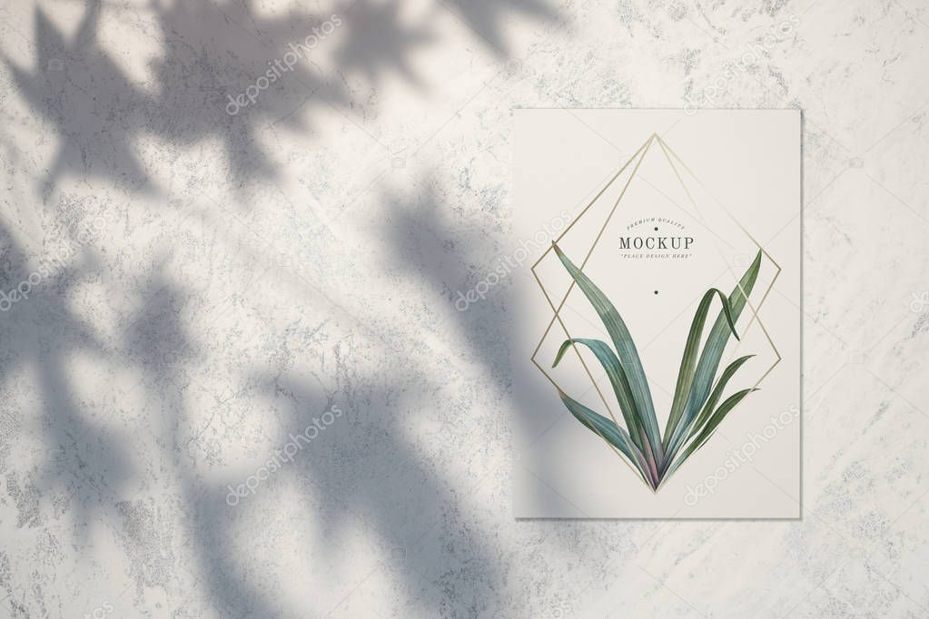 Premium quality card mockup with leaves and golden frames