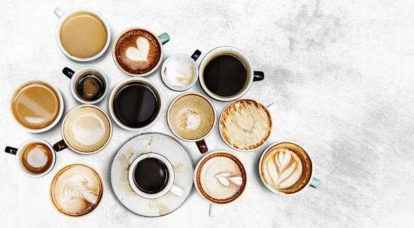 Diverse Koffie Kopjes Een Gestructureerde Achtergrond — Stockfoto